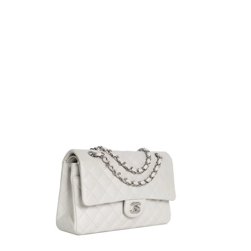 sac de seconde main timeless chanel  en cuir gris côté