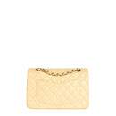 sac de seconde main timeless chanel  en cuir jaune dos