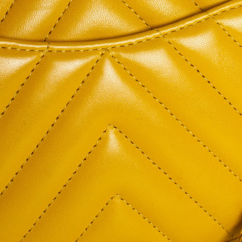 sac de seconde main timeless chanel en cuir jaune défaut 3