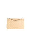 sac de seconde main timeless chanel en cuir beige dos