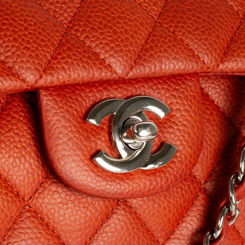 sac de seconde main timeless chanel  en cuir orange défaut 1