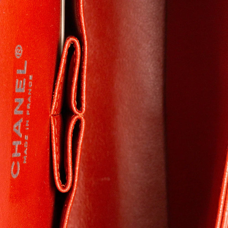 sac de seconde main timeless chanel  en cuir orange intérieur