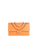 sac de seconde main timeless chanel  en cuir orange  face