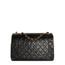 sac de seconde main timeless chanel  en cuir noir dos