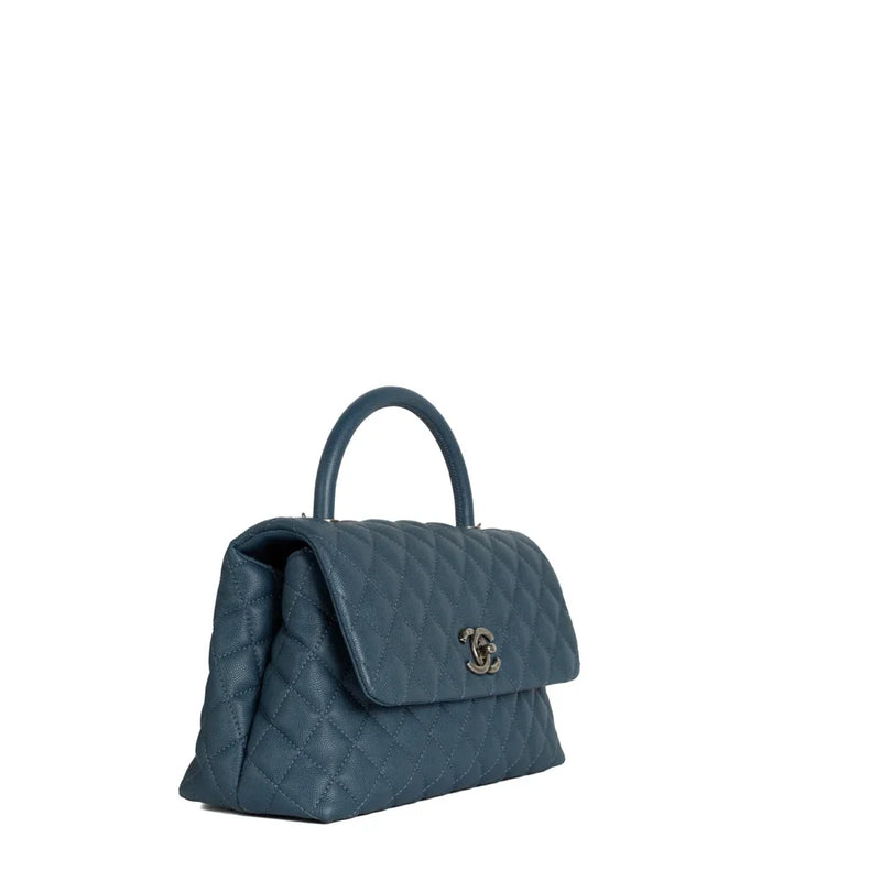 sac de seconde main trendy cc chanel en cuir bleu  côté