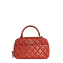 sac de seconde main trendy cc top handle chanel  en cuir rouge  face