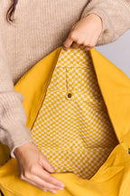 Grande borsa da viaggio unisex Yves color zafferano, fodera con stampa a blocchi