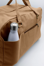 Große Unisex-Reisetasche Yves in Zimtbraun mit Taschen an der Rückseite