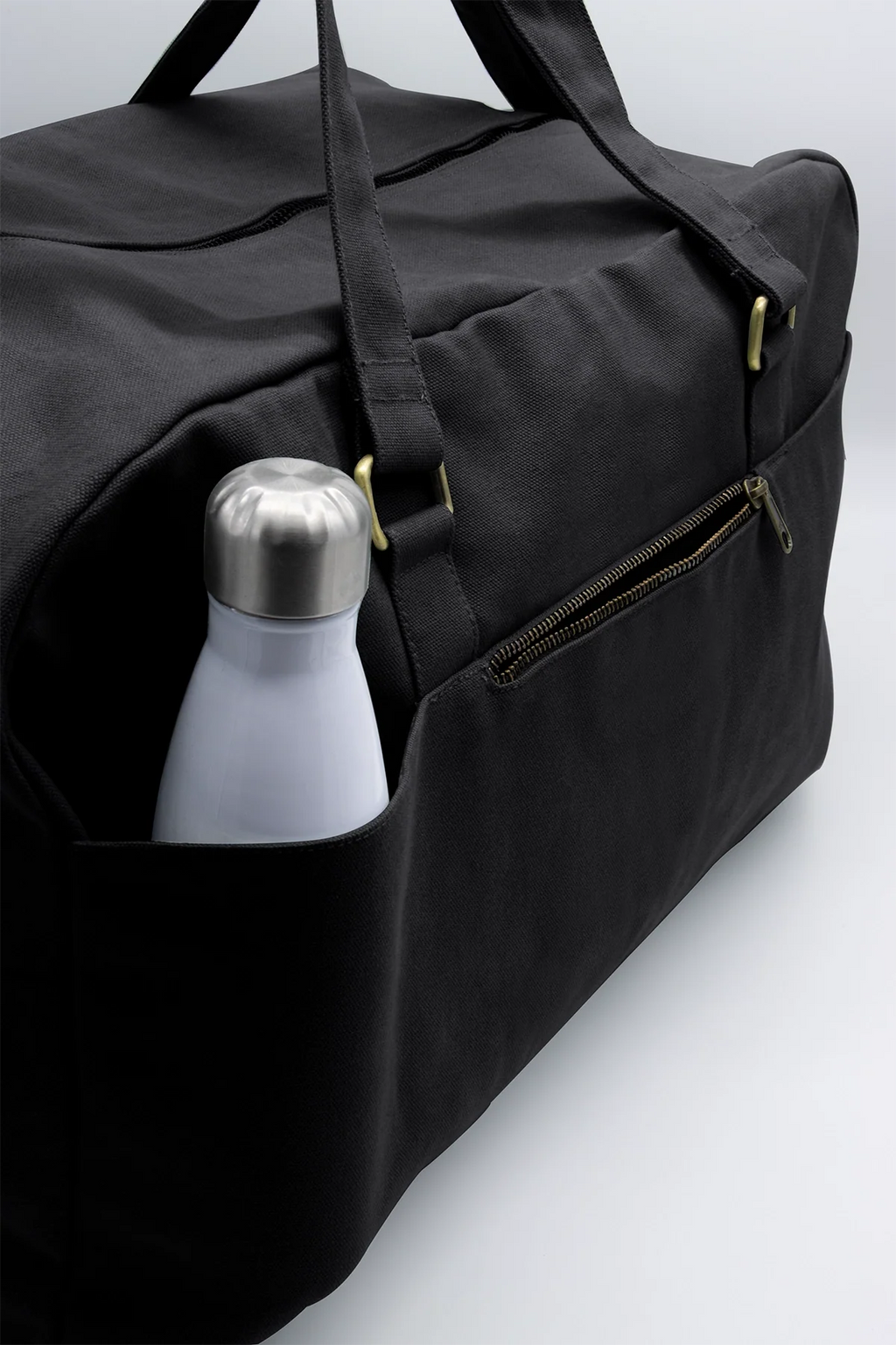 Große Unisex-Reisetasche Yves in Schwarz mit Taschen an der Rückseite