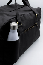 Große Unisex-Reisetasche Yves in Schwarz mit Taschen an der Rückseite