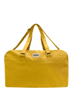 Grande borsa da viaggio unisex Yves color zafferano, vista frontale su sfondo neutro