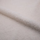 Fauteuil Simba en tissu bouclé blanc