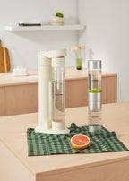 Studio Soda Maker - Sparkling Water Machine + 1L Bottle + Double Bottle (500ml + 350ml) - Off-White
