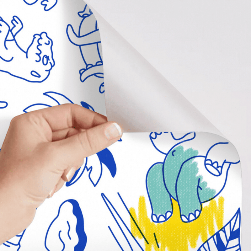 Démonstration de l’effet repositionnable du papier adhésif Stick-it Dinos avec motif colorié