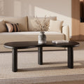 Brandan - Mesa de centro de madera maciza orgánica de Mindi Black