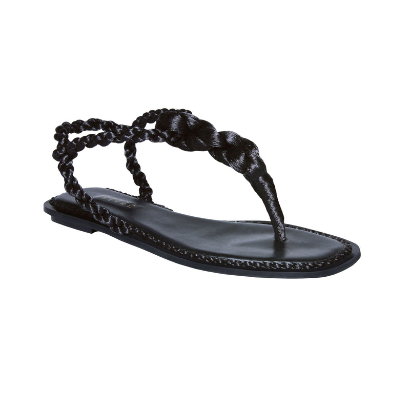 Thory black flat sandal featuring braided metallic thread straps and a luxurious Italian leather sole.