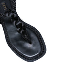Thory black flat sandal featuring elegant braided metallic thread design and soft Italian leather sole.