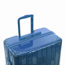 Poignée trolley télescopique GYL déployée sur la valise Intemporelle bleu grisé en polycarbonate. #couleur_bleu grisé