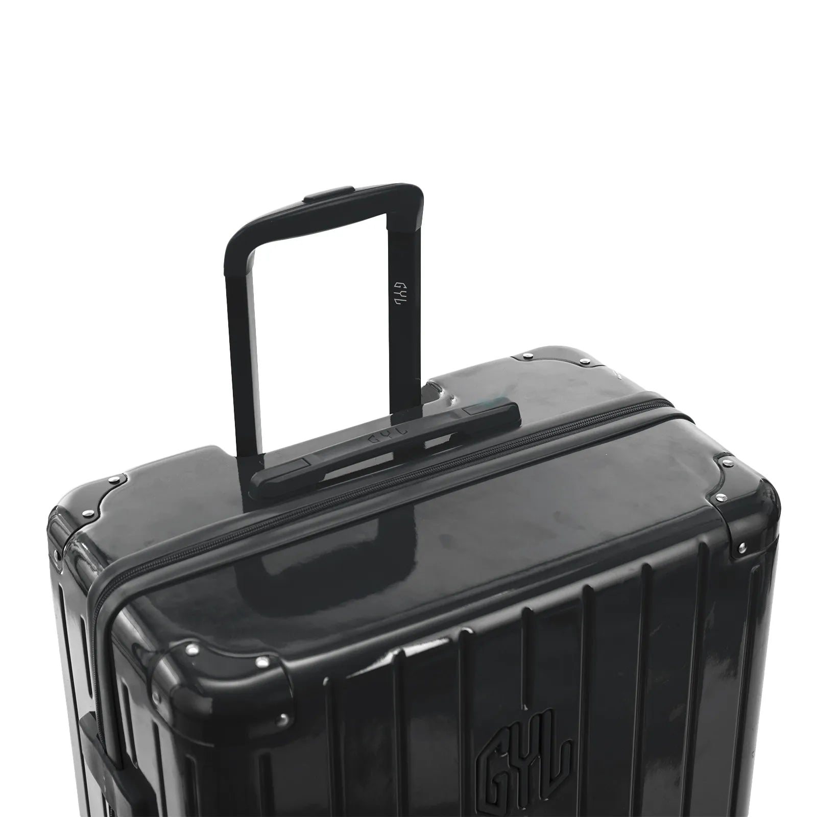 Poignée trolley télescopique GYL déployée sur la valise Intemporelle gris foncé en polycarbonate. #couleur_gris foncé