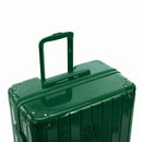 Poignée trolley télescopique GYL déployée sur la valise Intemporelle sapin en polycarbonate. #couleur_sapin