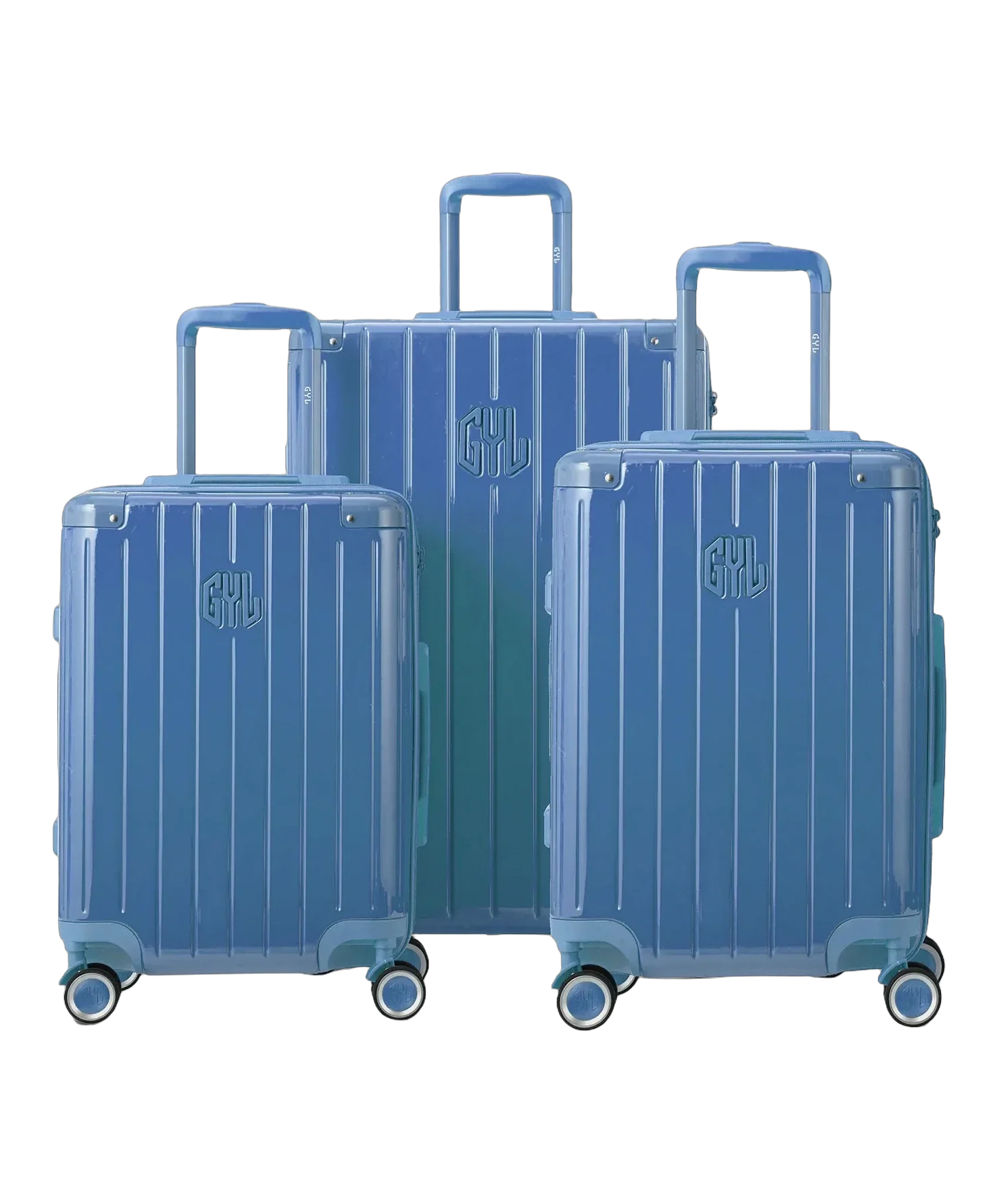 Set de 3 valises rigides Intemporelle en polycarbonate coloris bleu grise vue de face avec logo GYL