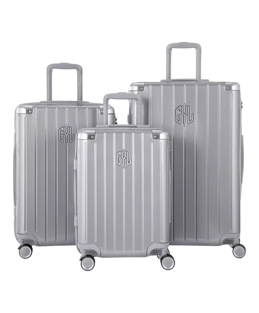 Valise Intemporelle en polycarbonate set de 3 valises cabine semaine et soute coloris argent vue de face du set complet