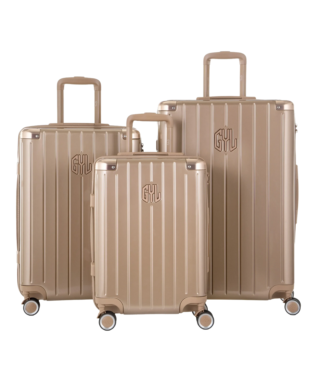 Valise Intemporelle en polycarbonate set de 3 valises cabine semaine et soute coloris champagne vue de face du set complet