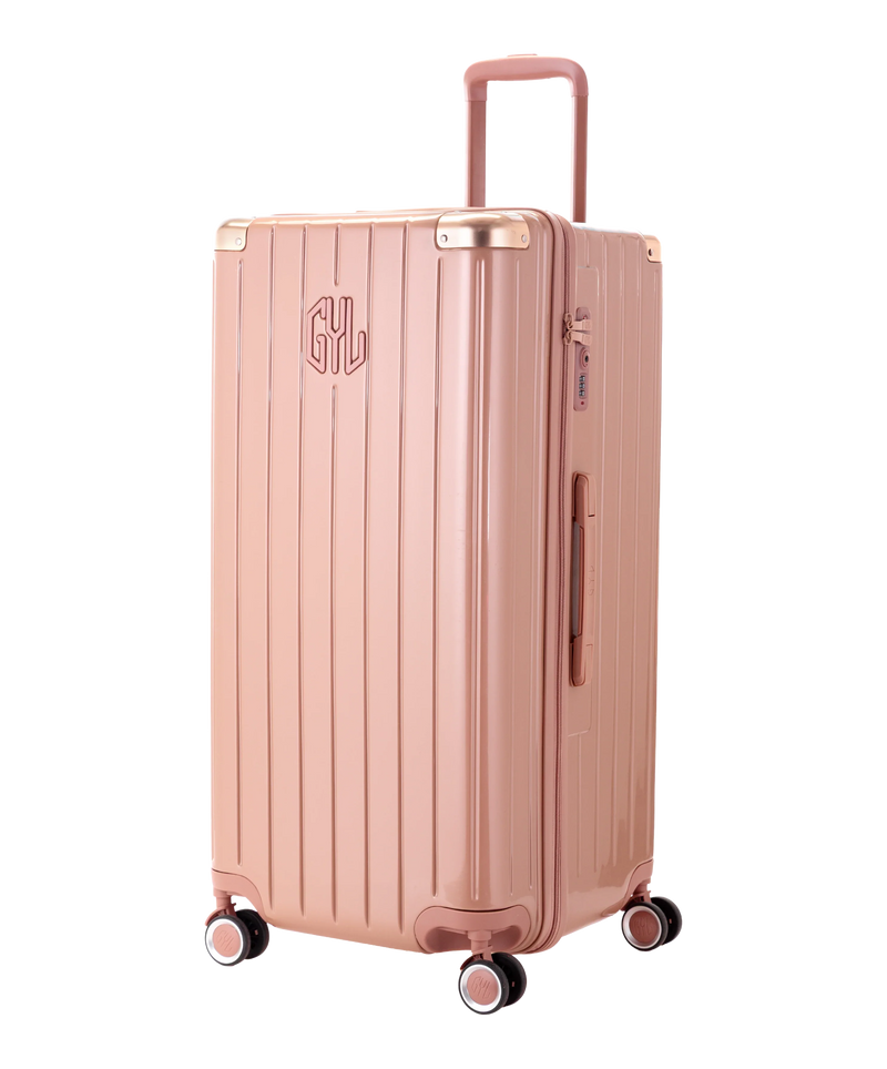 Valise Trunk GYL en polycarbonate Trunk XL 80 cm coloris rose gold vue trois quarts avant