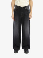 Le Pantalon Baggy En Denim Noir Délavé