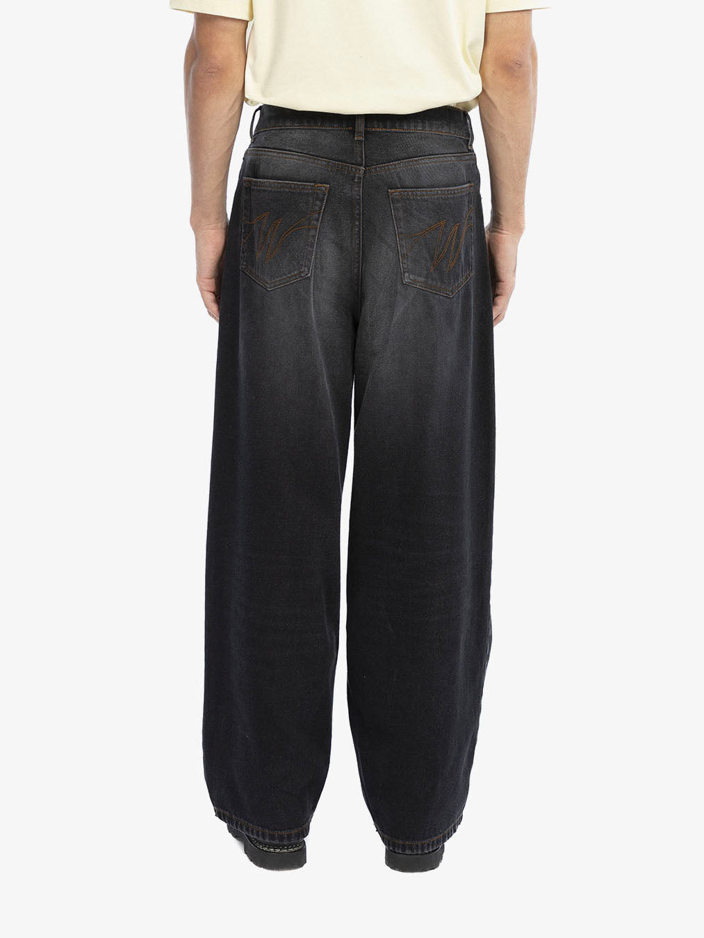 Le Pantalon Baggy En Denim Noir Délavé
