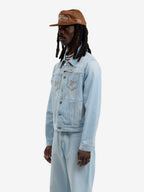La Veste Du Postier En Denim Clair Délavé