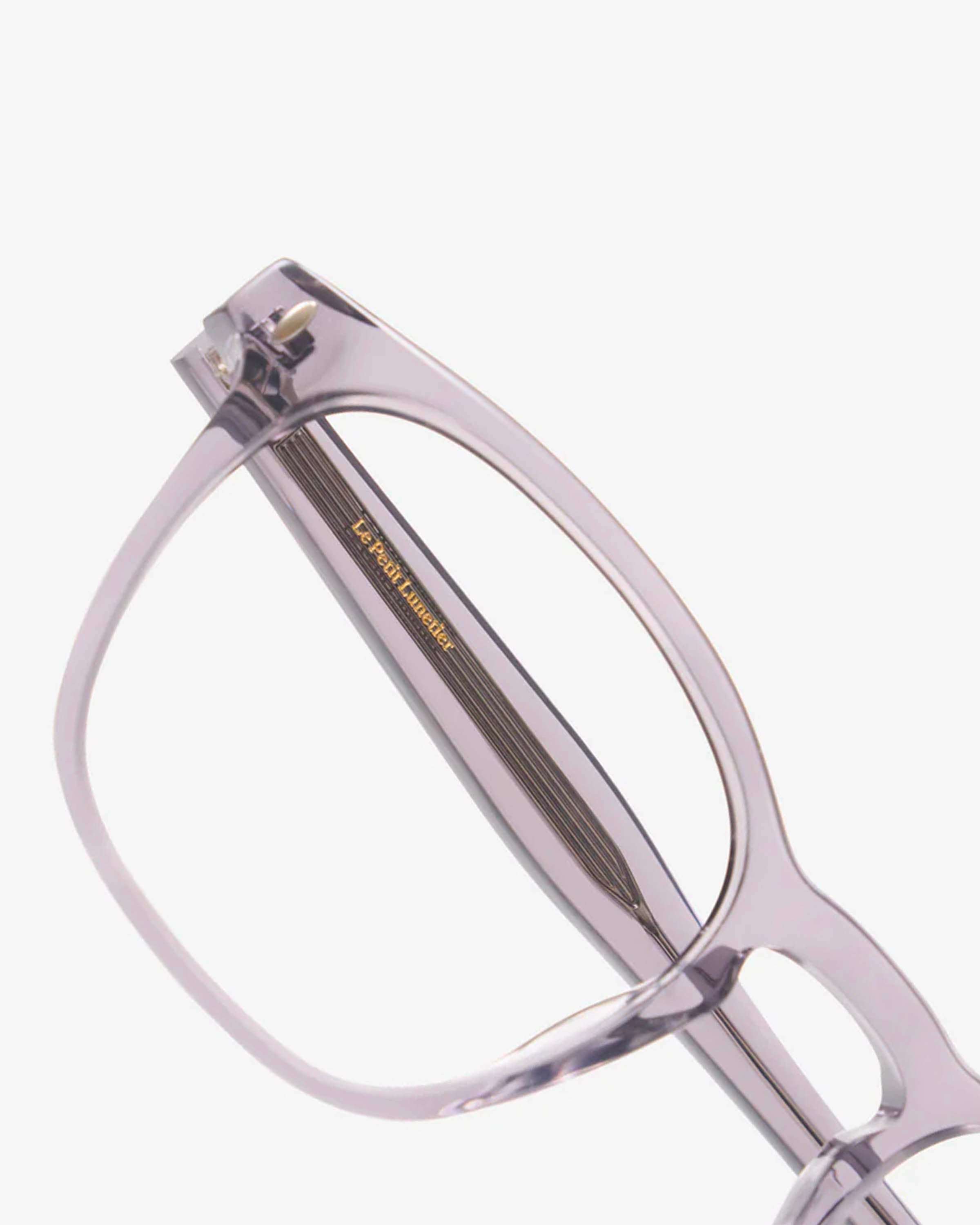Primer plano de la montura rectangular de acetato de los anteojos Jay Gris