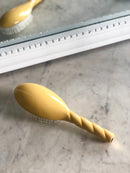 Brosse de massage cheveux jaune