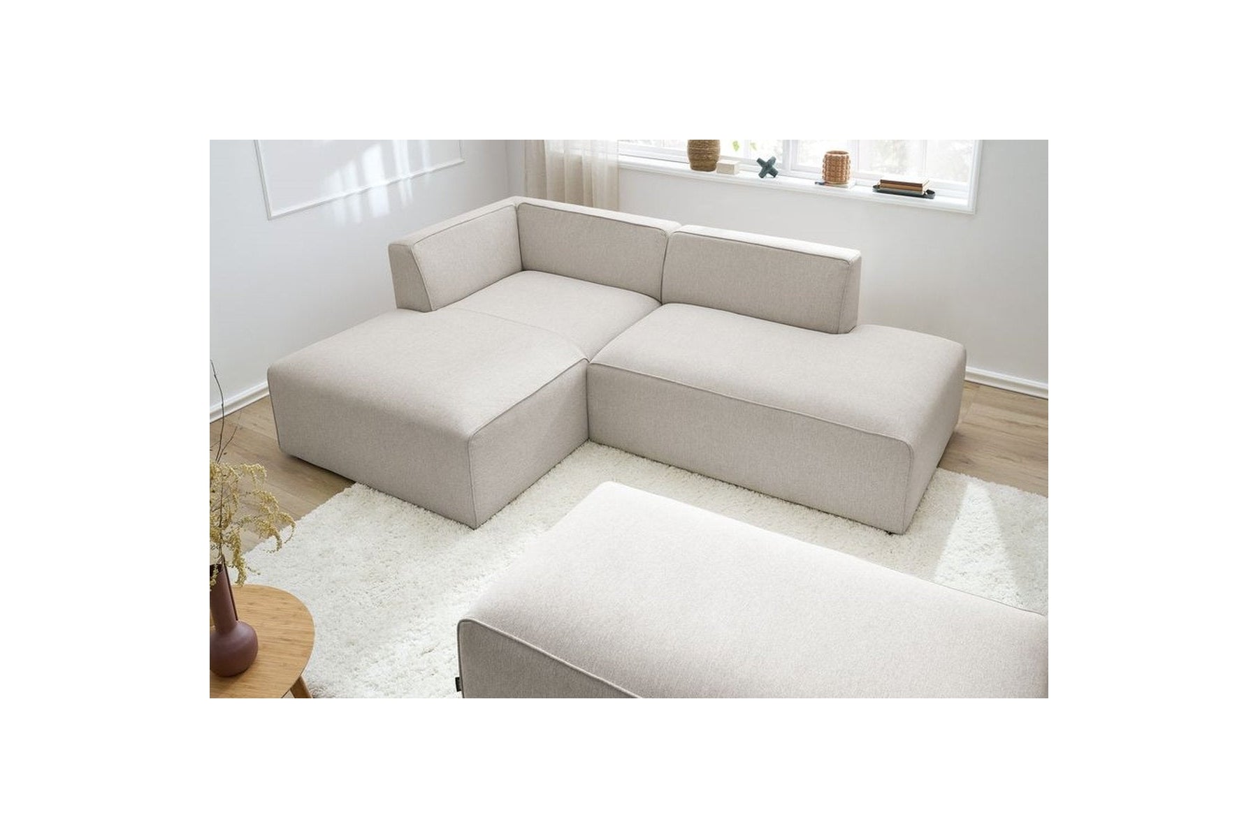 Modular fixed corner sofa MEGEVE in smooth fabric with pouffe - Left-hand corner - BOBOCHIC - The Bradery