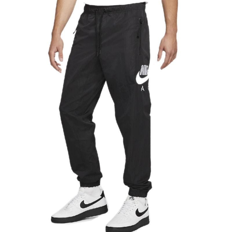 M Nsw Air Woven Pant - Pantalón textil para hombre - Negro PANTALÓN TEXTIL PARA HOMBRE Nike