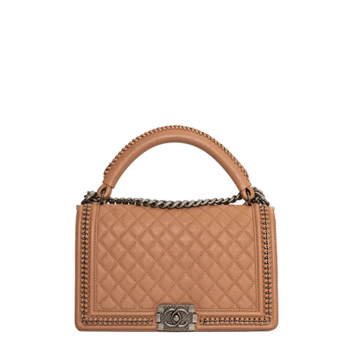 sac de seconde main boy chanel  en cuir beige face