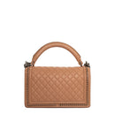 sac de seconde main boy chanel  en cuir beige dos