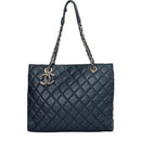 sac de seconde main cabas chanel en cuir bleu anse