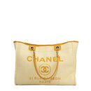 sac de seconde main deauville chanel en toile jaune face