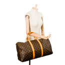 sac de seconde main keepall louis vuitton en toile monogram marron porté