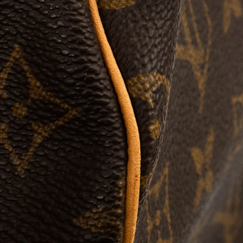 sac de seconde main keepall louis vuitton en toile monogram marron défaut 2