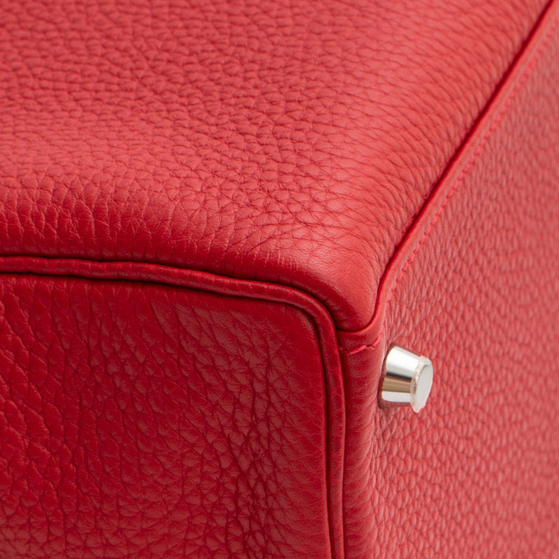 sac de seconde main kelly hermès  en cuir rouge  coin