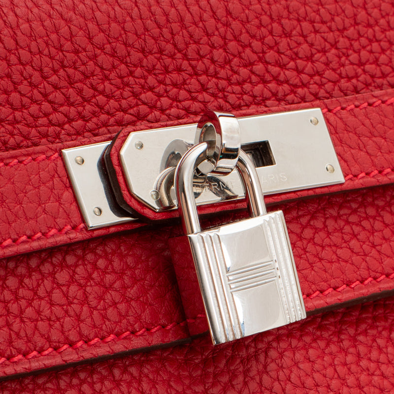 sac de seconde main kelly hermès  en cuir rouge  défaut 1