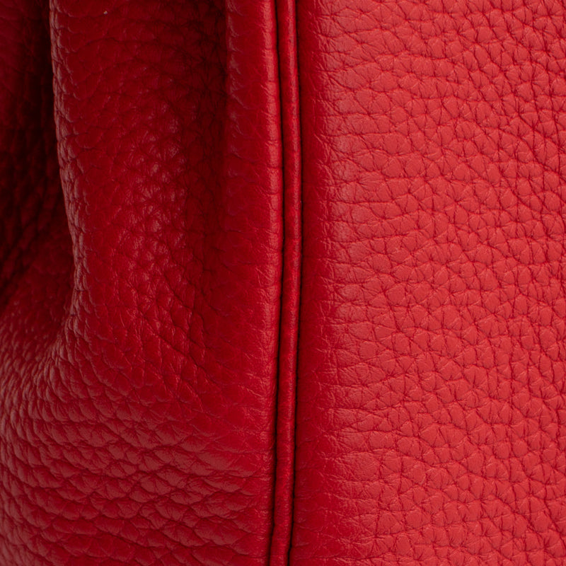 sac de seconde main kelly hermès  en cuir rouge  défaut 2