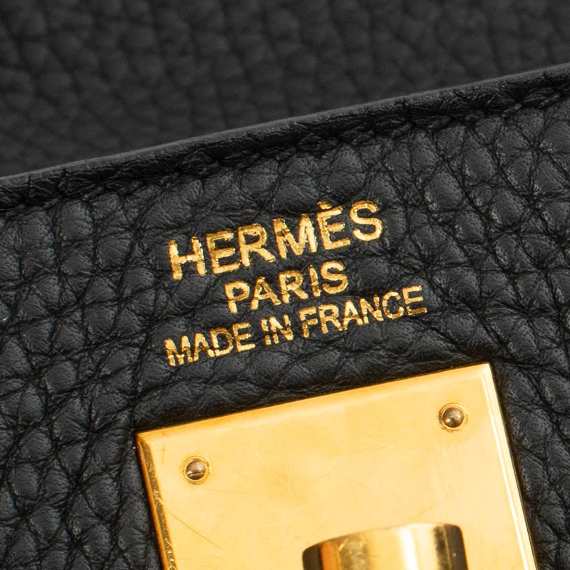 sac de seconde main kelly  hermes en cuir noir label