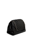 sac de seconde main mademoiselle chanel en cuir verni noir côté