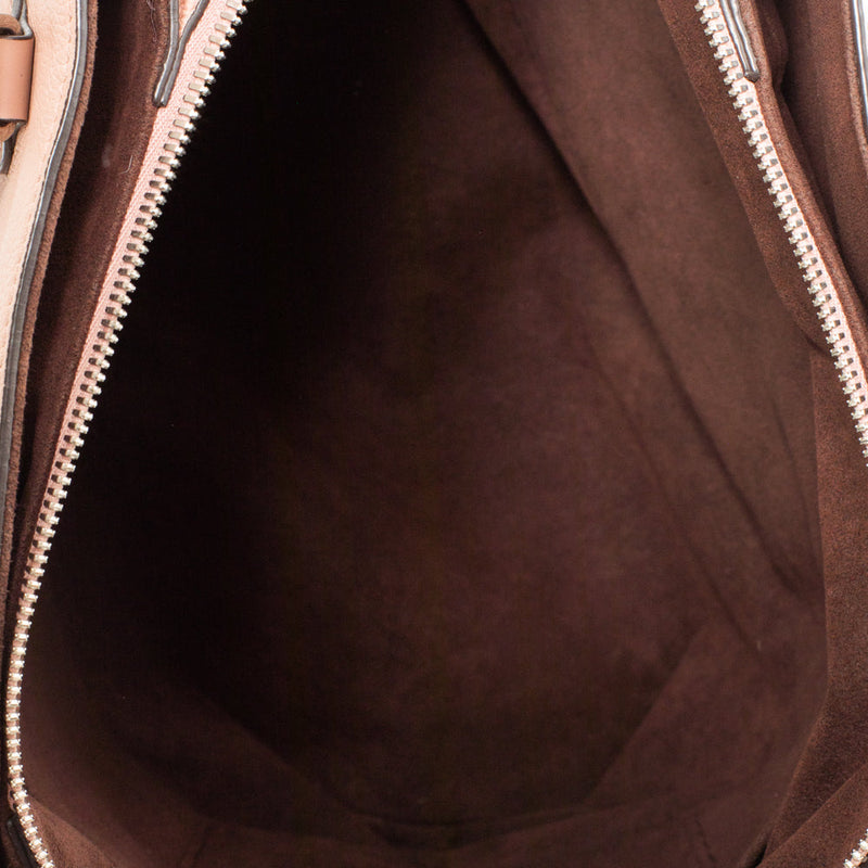 sac de seconde main mahina louis vuitton  en cuir rose intérieur