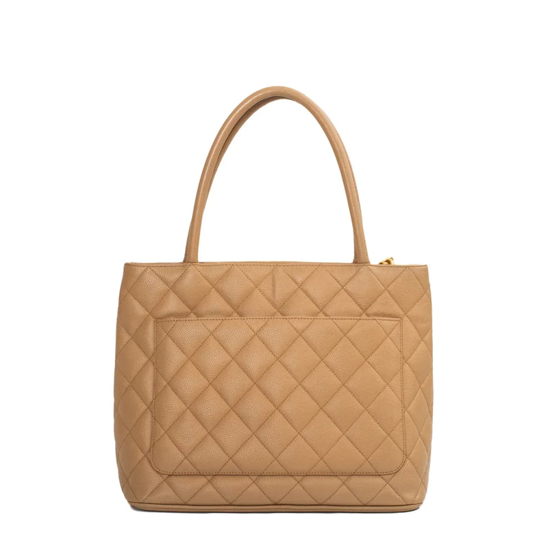 sac de seconde main medaillon chanel  en cuir beige dos