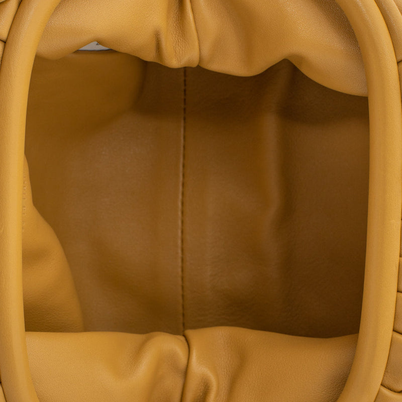 sac de seconde main pouch bottega veneta  en cuir jaune  intérieur