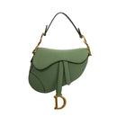 sac de seconde main saddle  dior  en cuir vert face